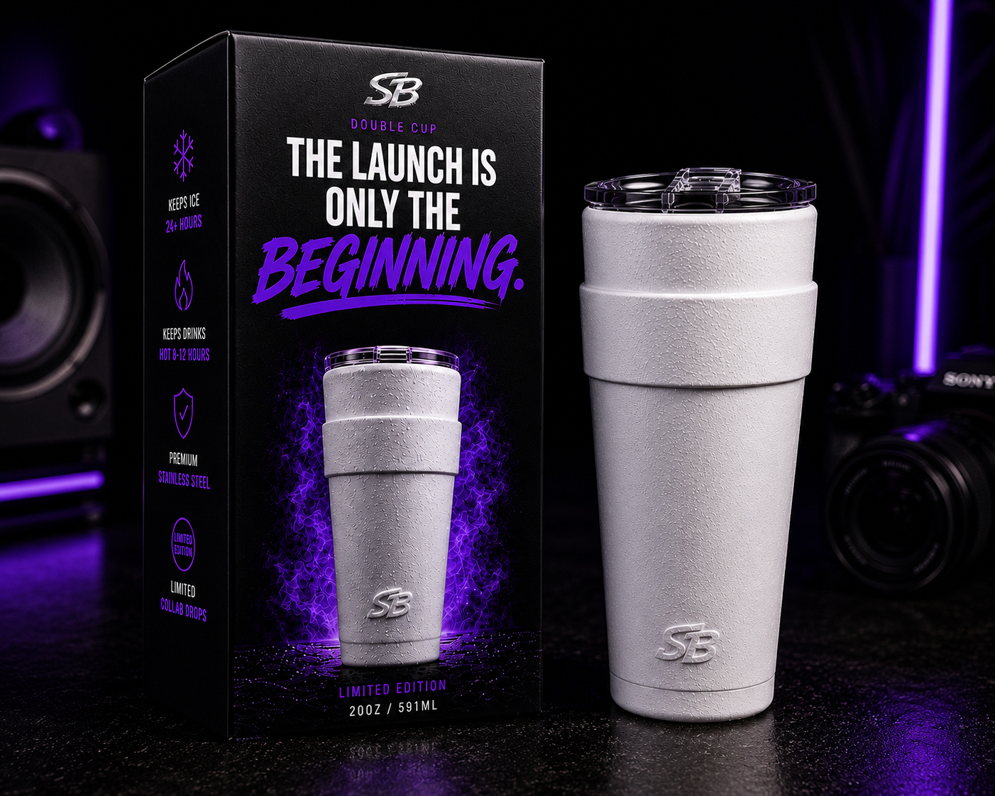 Double Cup launch box beside a white tumbler under purple lighting